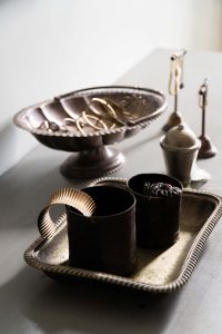 Moroccan brass canisters are popular vintage props for photoshoot