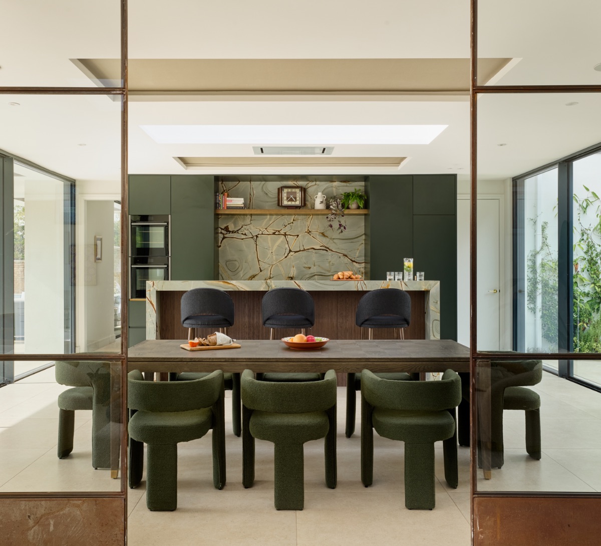 Green marble kitchen with critical doors